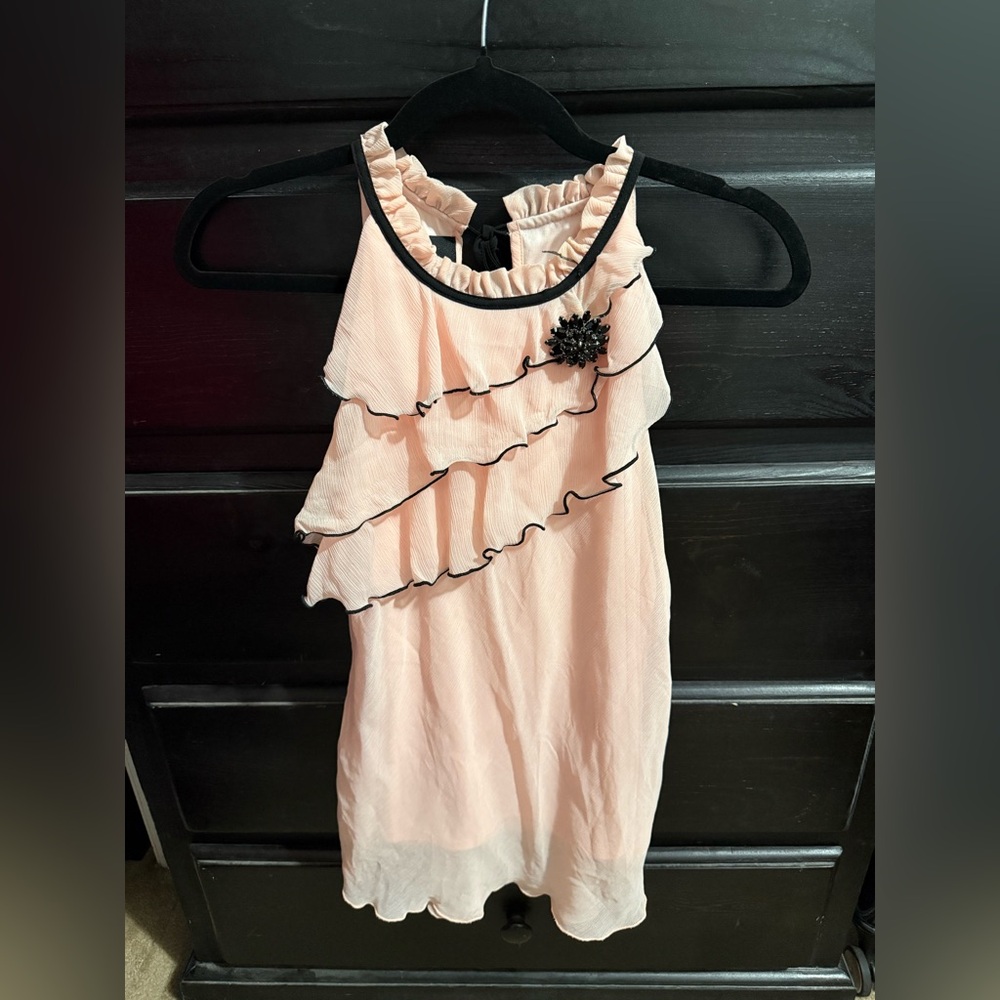Ruffled Peach Sleeveless Top with Black Trim
